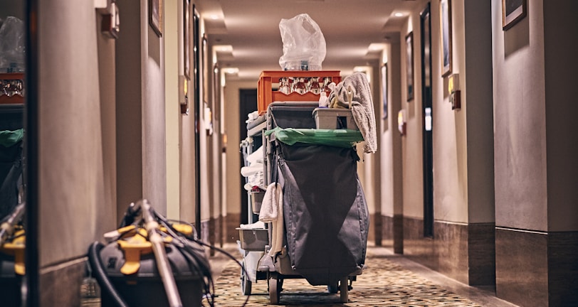 black and gray stroller on hallway