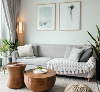 a living room filled with furniture and a large window
